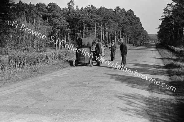 MEN REPAIRING ROAD